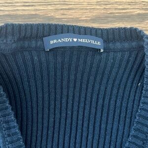 One size brandy Melville vneck sweater fits like small